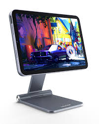 Experience ultimate convenience with our 360 Rotating Foldable Magnetic iPad Stand. This versatile stand allows for adjustable viewing angles, making it perfect for watching videos, video calls, or working on your iPad hands-free. Its foldable design ensures easy portability, while the magnetic feature provides a secure grip for your device. Crafted from durable materials, this stand combines functionality and style, making it an essential accessory for any iPad user.